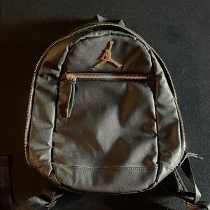 Mini Nike Jordan Skyline Faux Leather Black Backpack with Metallic Accents